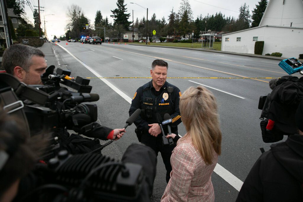 Capt. Robert Goetz of the Everett Police Department speaks with the media during a police standoff related to a shooting at The Bluffs Apartments on West Casino Road on Monday, Jan. 22, 2024, in Everett, Washington. (Ryan Berry / The Herald) 